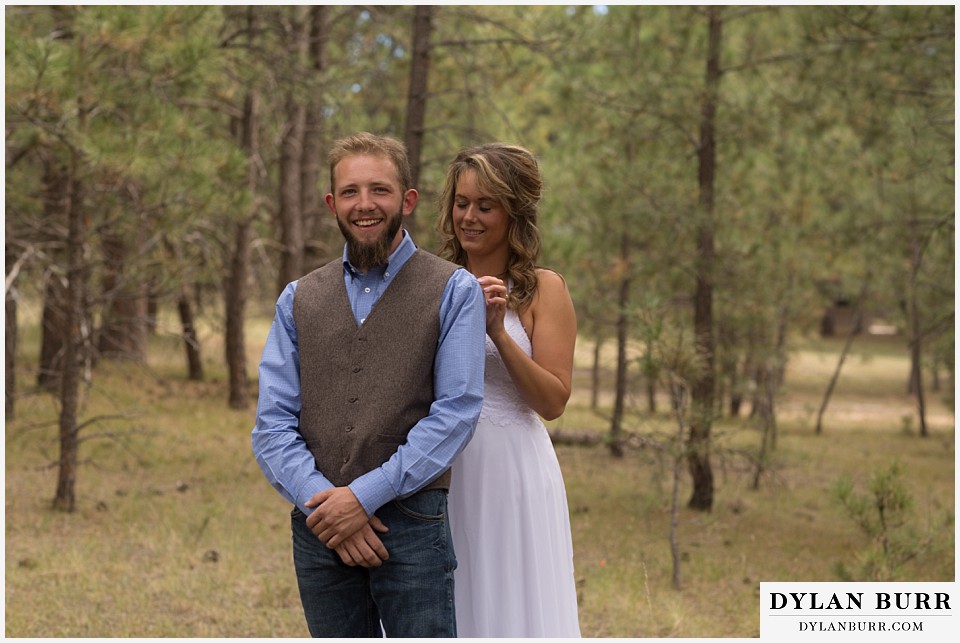 boho backyard colorado wedding excited groom to see wife