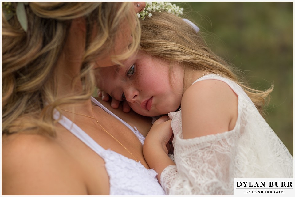 boho backyard colorado wedding taking a moment with mom before ceremony