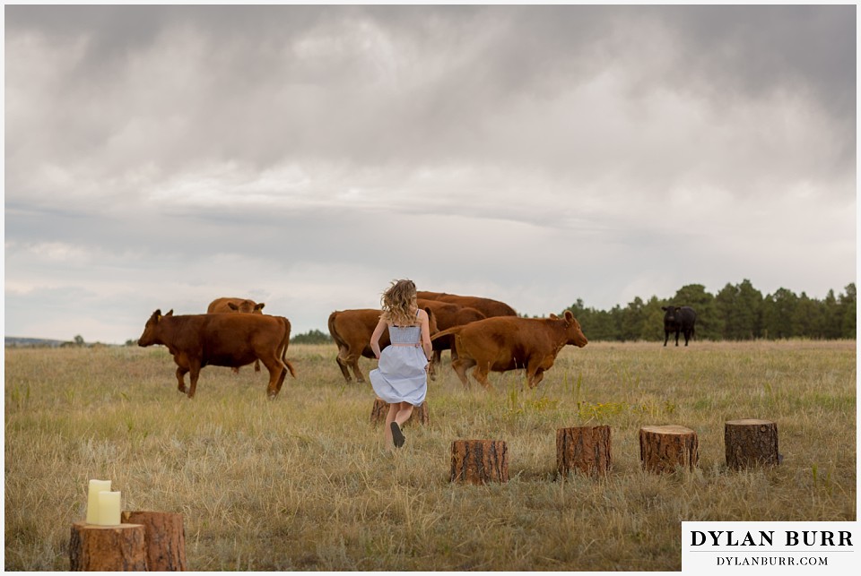 boho backyard colorado wedding chasing off cows