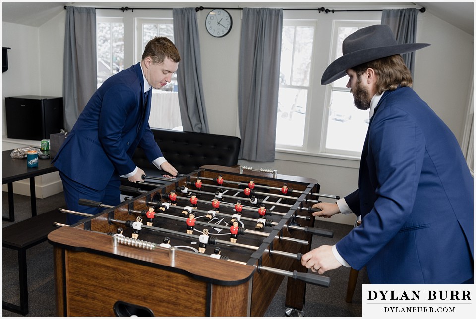 boulder creek by wedgewood wedding groomsmen playing fooseball