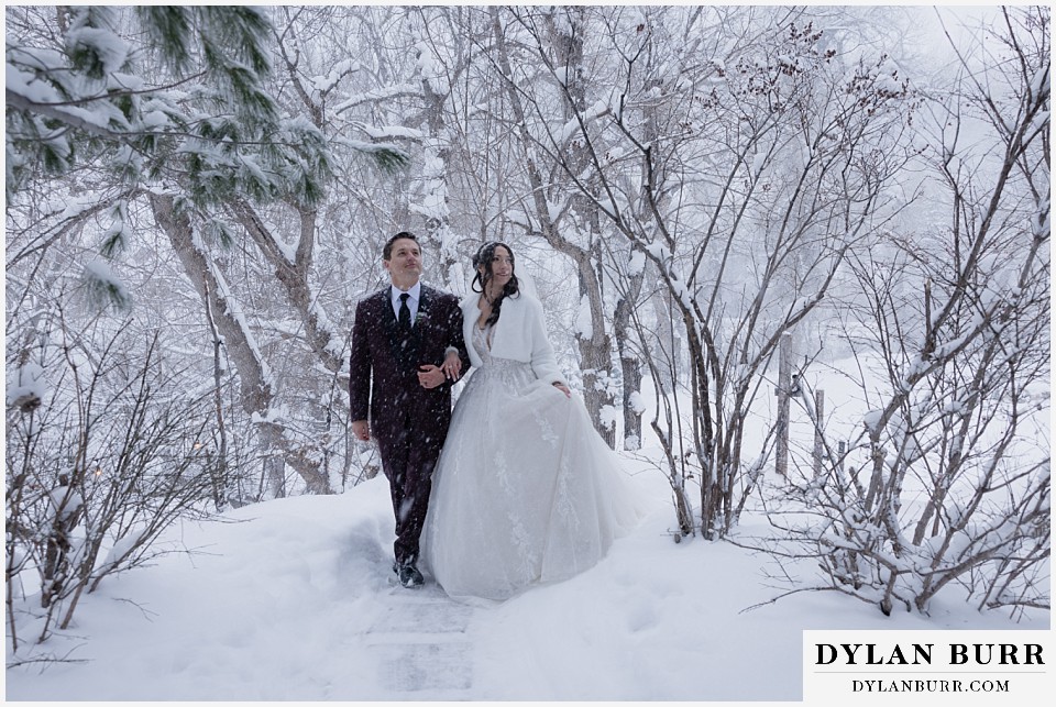 boulder creek by wedgewood weddings couple walking in snowy forest together