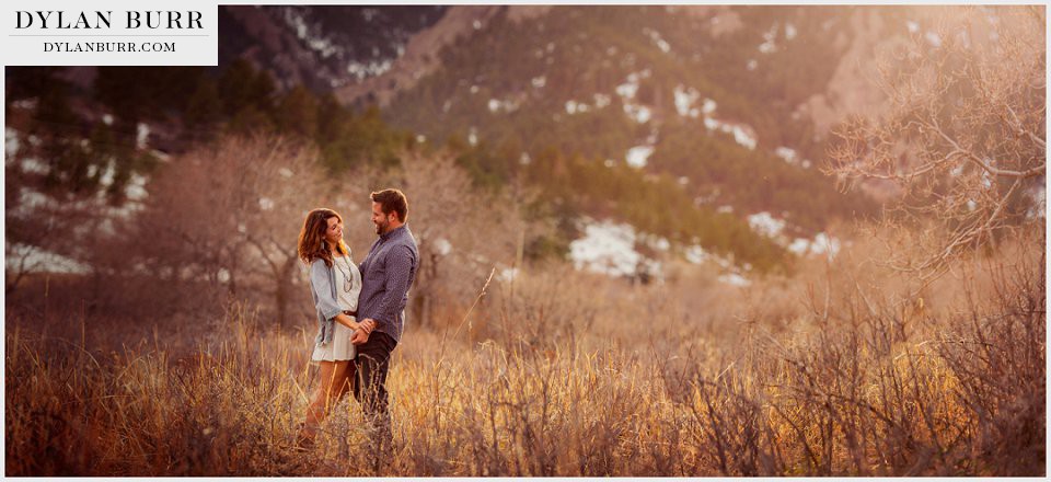 sunset engagament photos boulder in tall grass