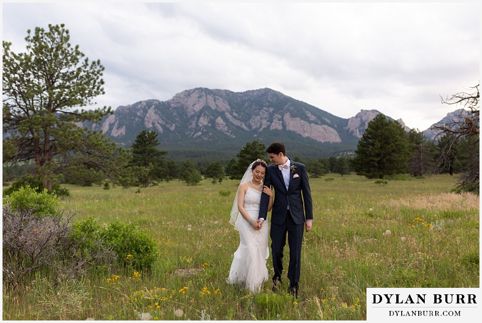 boulder flatirons wedding elopement bride and groom walking together