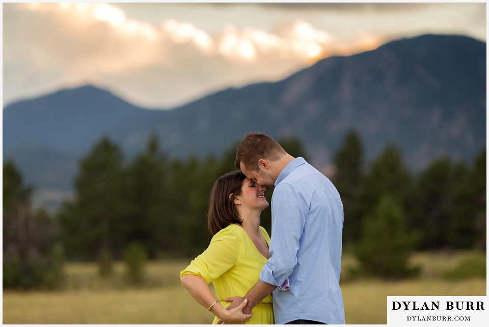 boulder wedding engagement session sunset kiss