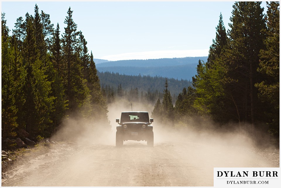 breckenridge 4wd adventure wedding jeep on dirt road in mountains