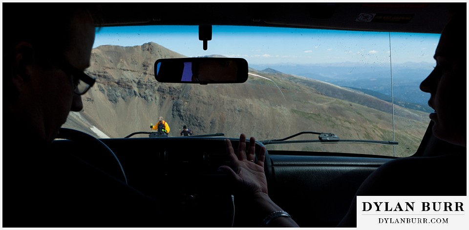 breckenridge 4wd adventure wedding looking out of jeep window going down with hikers coming up