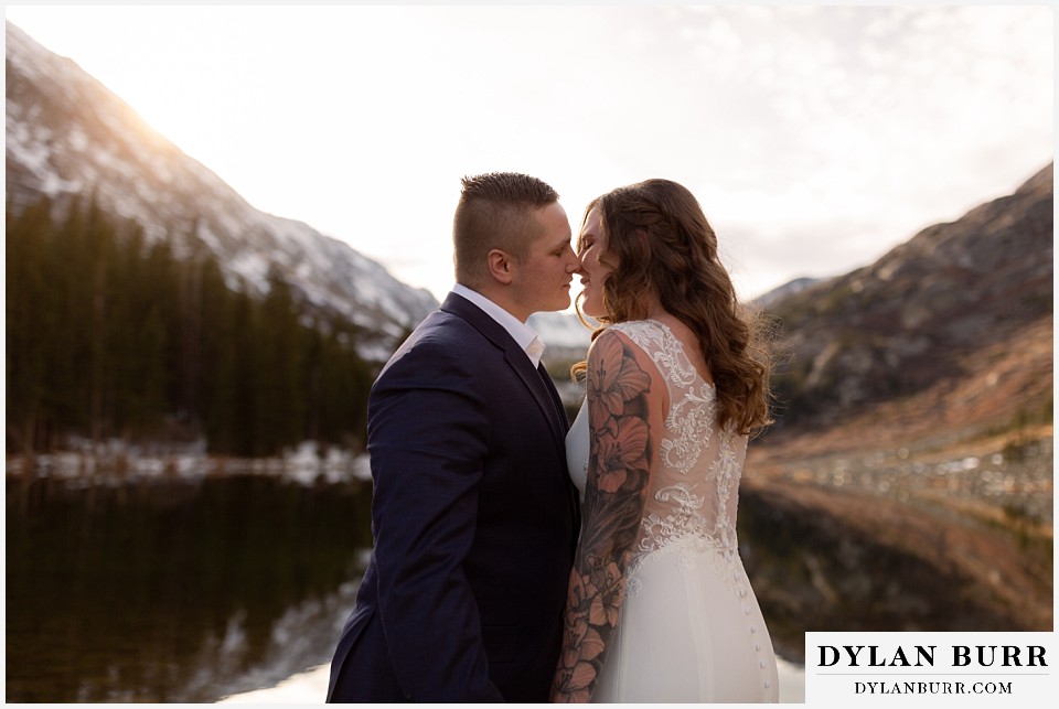 Breckenridge Colorado Mountain Elopement bride and groom about to kiss