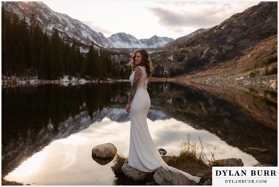 gorgeous bride near alpine mountain lake near breckenridge colorado wedding