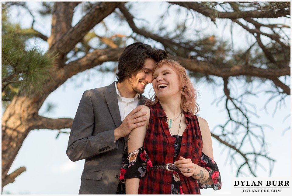 castle rock colorado engagement session laughing in mountains