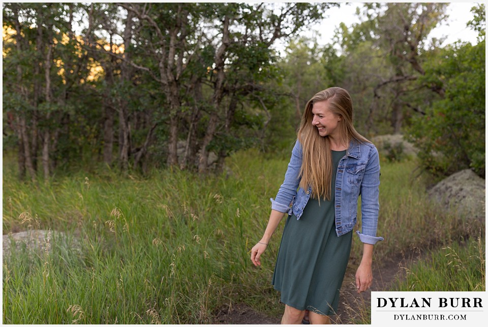 castlewood canyon engagement photos bride walking along trail