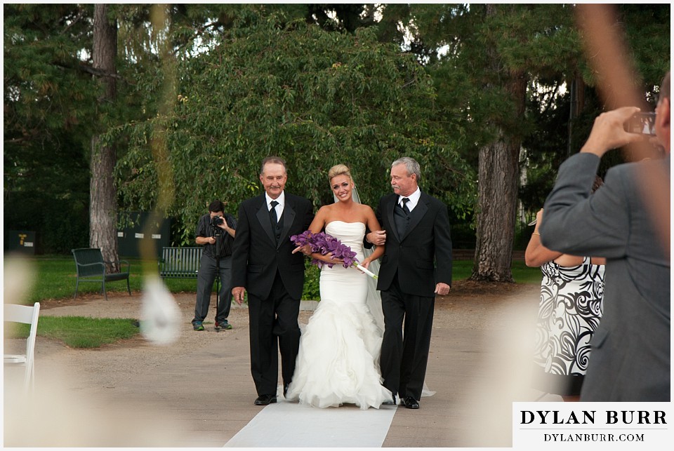 cheesman park pavilion wedding bride walking down aisle with dads