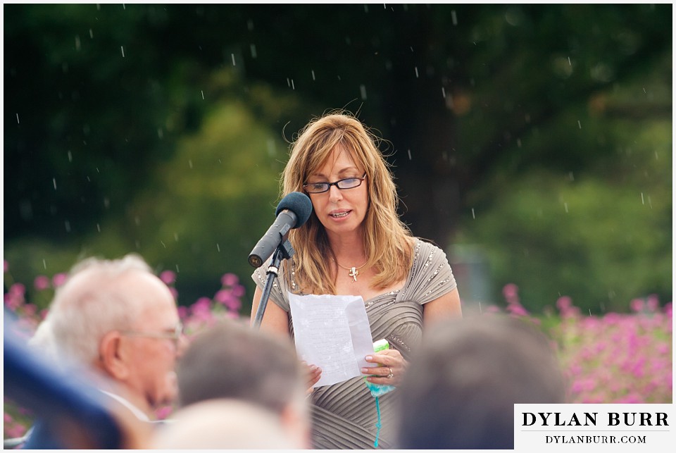 cheesman park pavilion wedding mom reading in rain