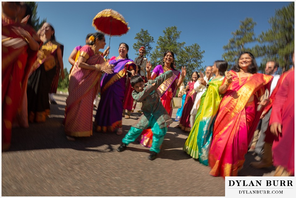 cielo at castle pines wedding colorado mountain wedding kid dabbing hindu barat wedding