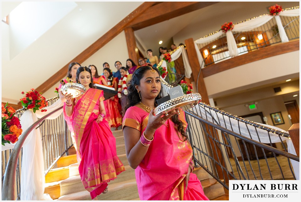 cielo at castle pines wedding colorado mountain wedding bridesmaids coming down stairs