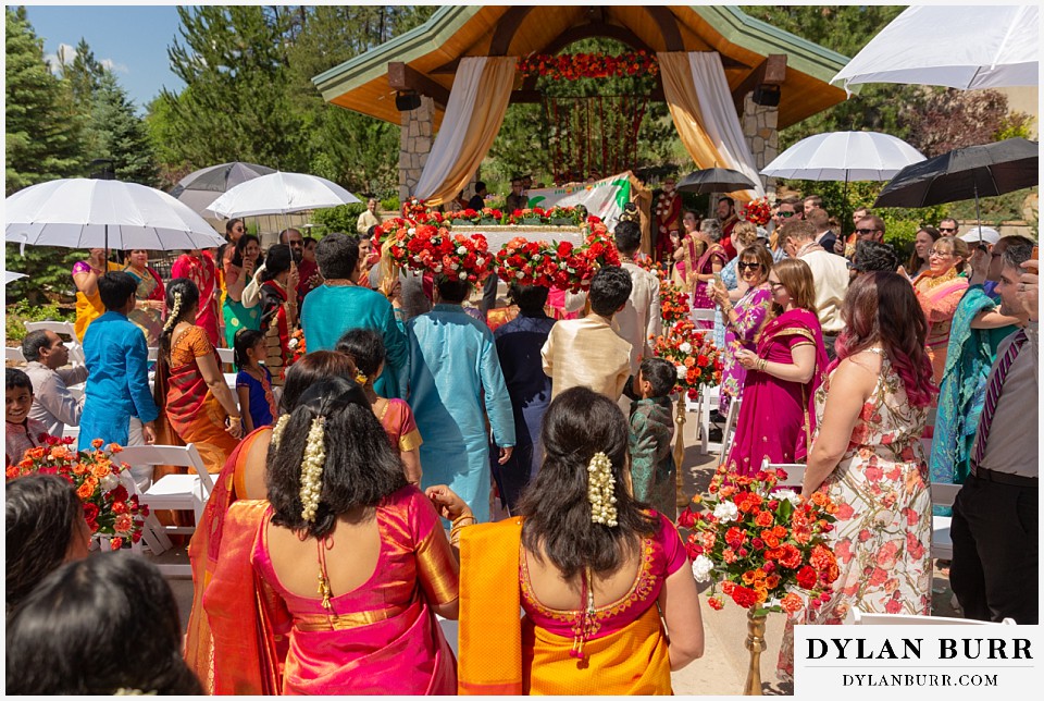 cielo at castle pines wedding colorado mountain wedding bride walking into wedding ceremony site