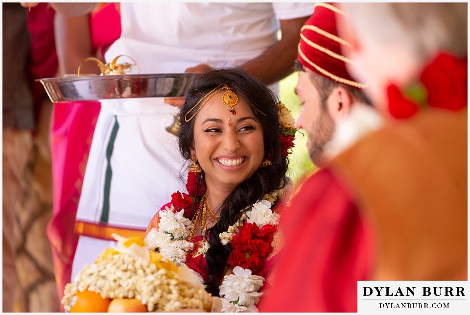 cielo at castle pines wedding colorado mountain wedding bride looking on at groom hindu ceremony