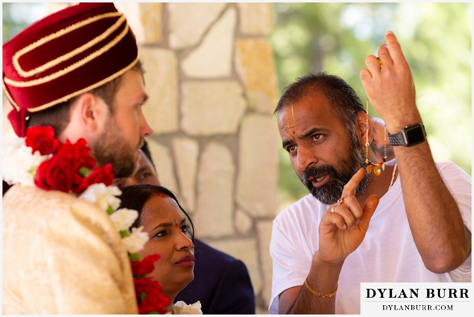 cielo at castle pines wedding colorado mountain wedding groom and hindu priest