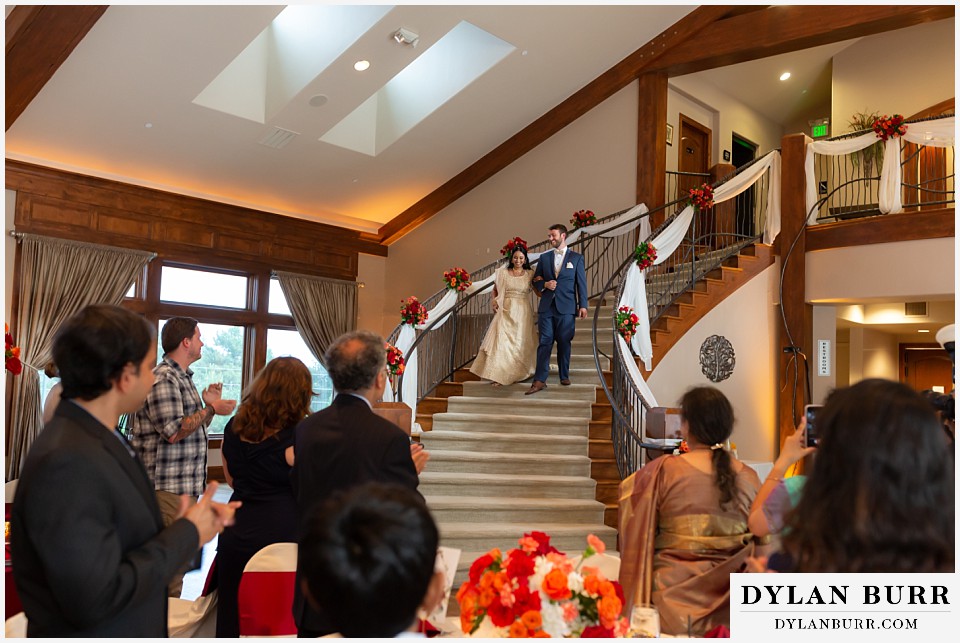 cielo at castle pines wedding colorado mountain wedding bride and groom enter wedding reception hindu wedding