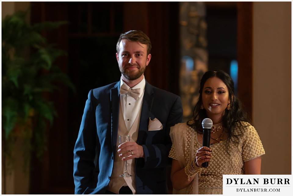 cielo at castle pines wedding colorado mountain wedding newlywed hindu couple giving speech