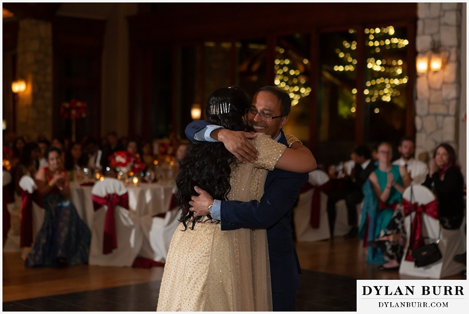 cielo at castle pines wedding colorado mountain wedding hindu bride and father hugging