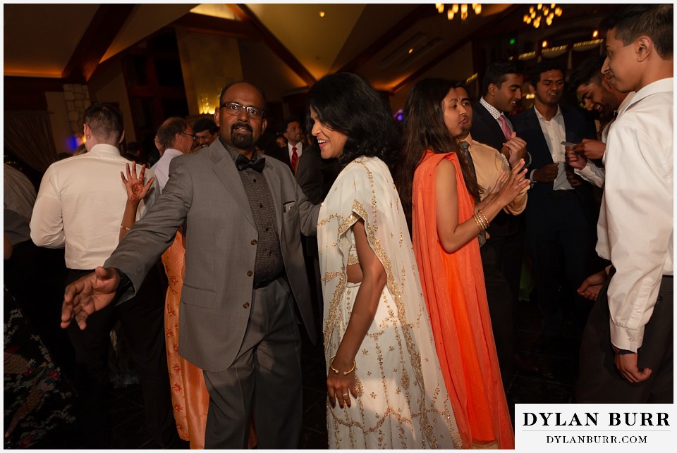 cielo at castle pines wedding colorado mountain wedding showing off hindu dance moves