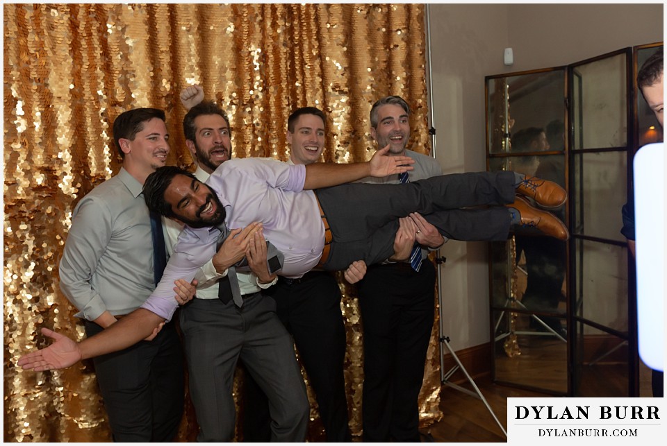 cielo at castle pines wedding colorado mountain wedding goofy photobooth poses