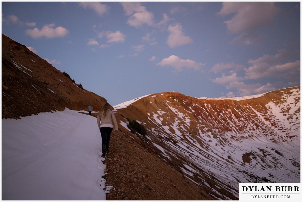 colorado mountain engagement session hiking to the top