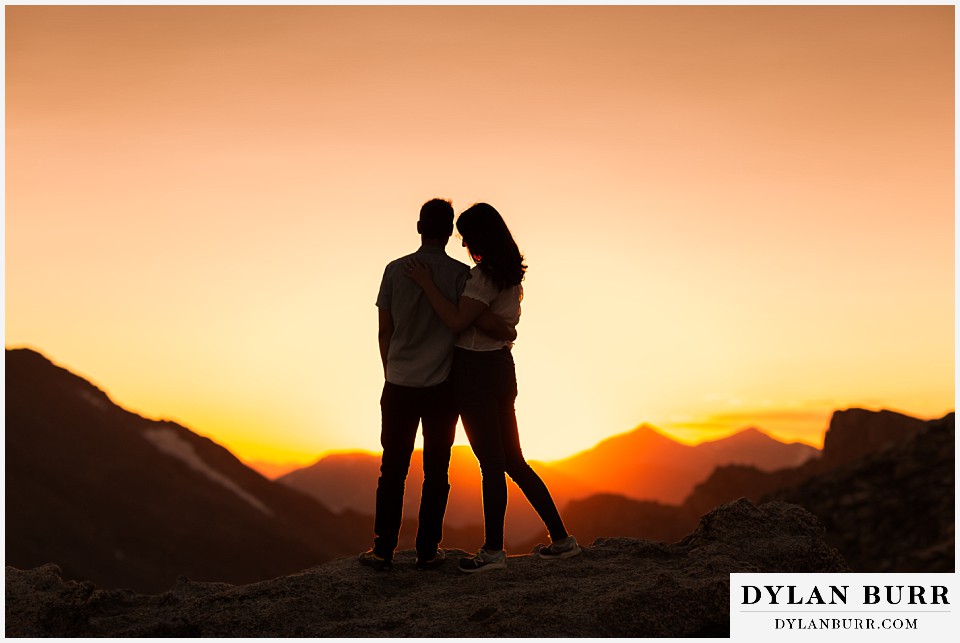 colorado mountain engagement photos colorado wedding photographer dylan burr couple looking out watching the sunset