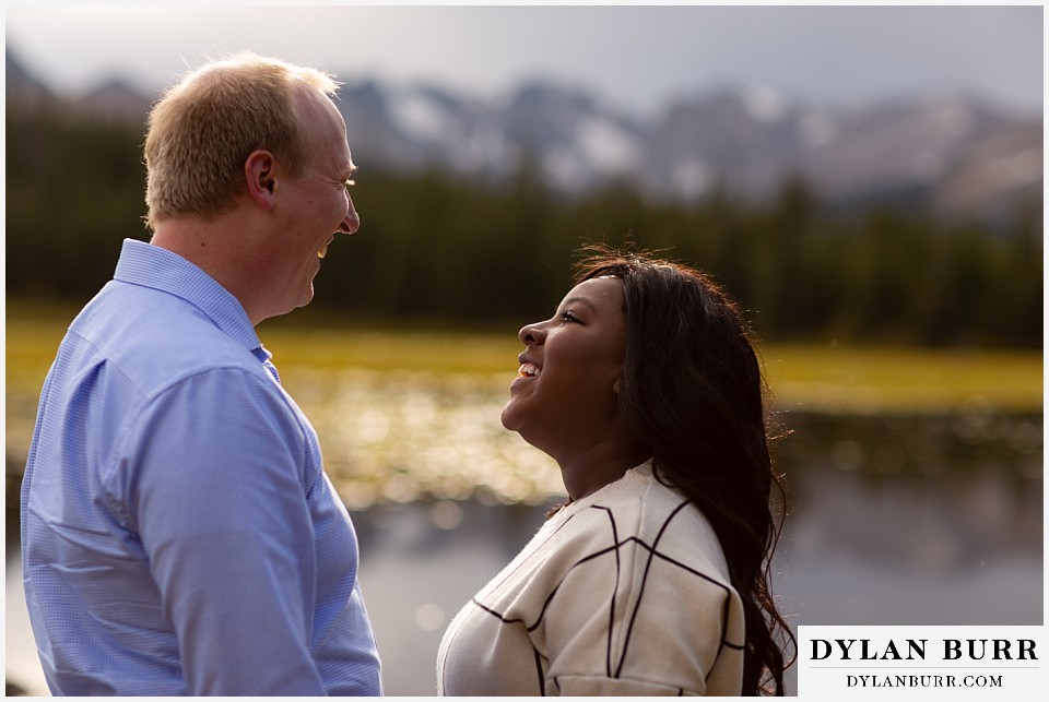 colorado mountain engagement photos couple close up looking at each other