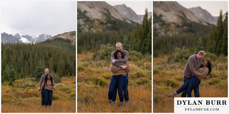 colorado mountain engagement photos couple playing together in mountain meadow