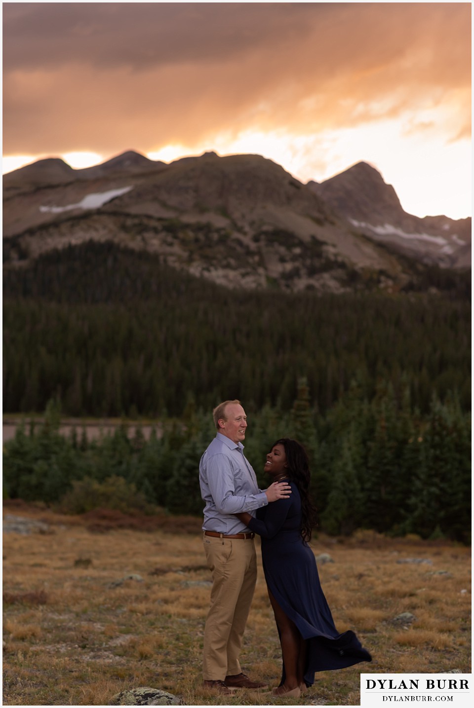 colorado mountain engagement photos couple with bride in blue dress