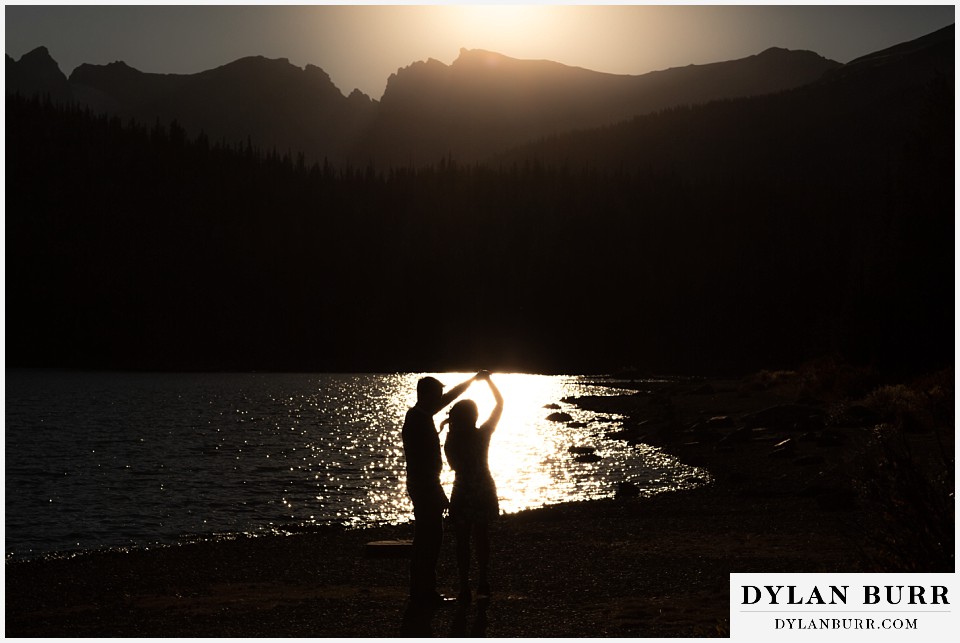 colorado engagement photos in mountains dancing silhouette