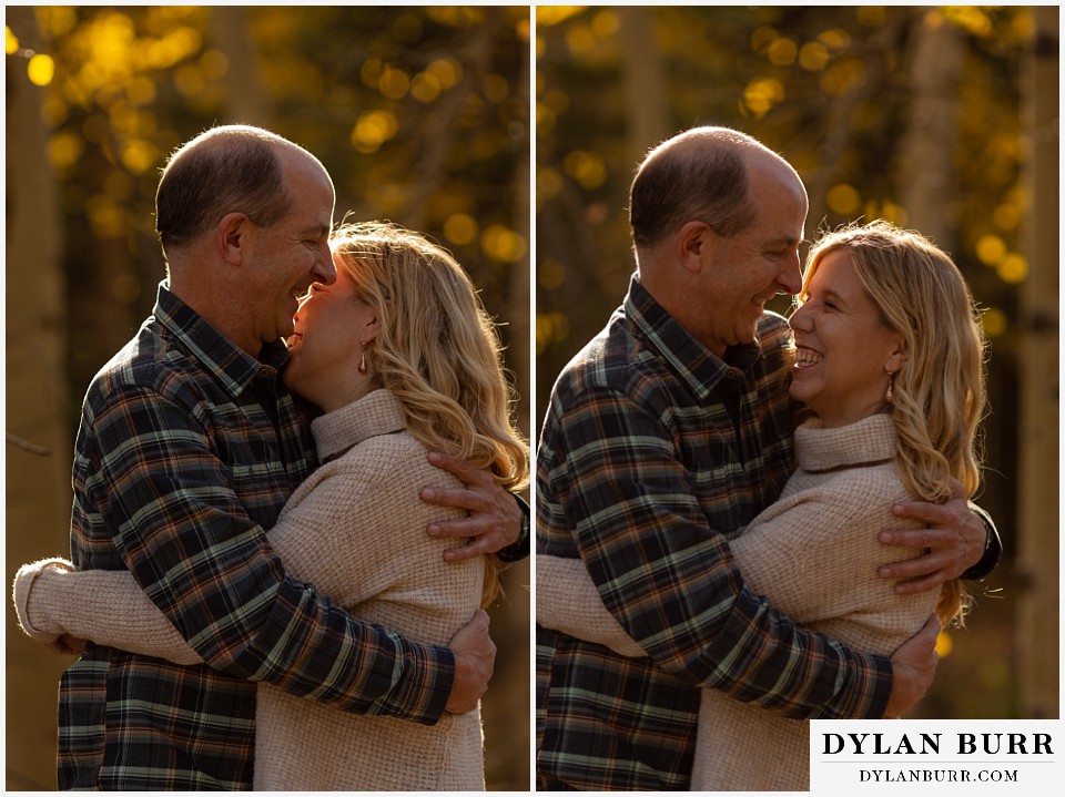 colorado engagement session in mountains couple coming in close together
