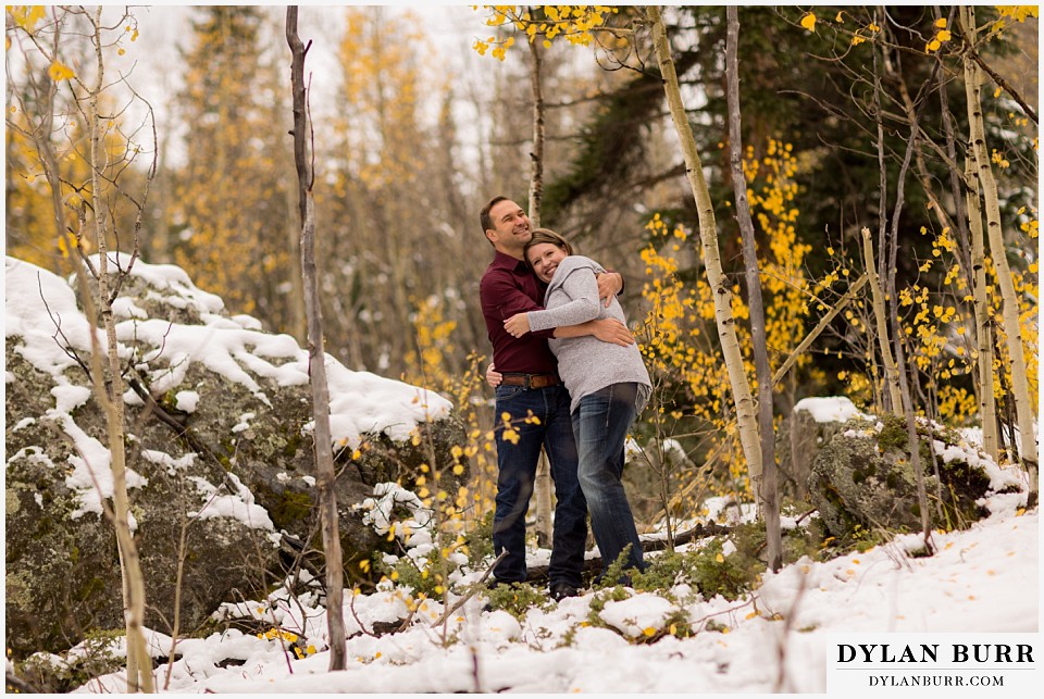 colorado mountain engagement session sharing a sweet moment and a hug