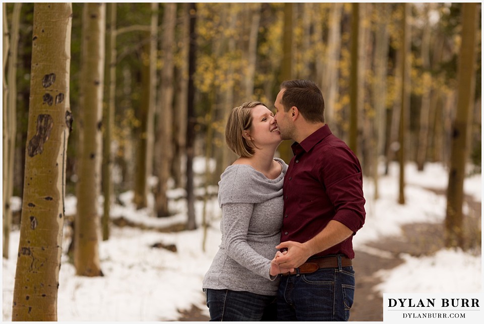 colorado mountain engagement session aspen trees kissing