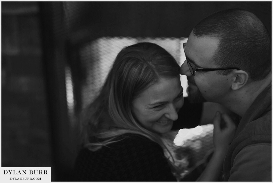 colorado mountain engagement photos fireplace kisses