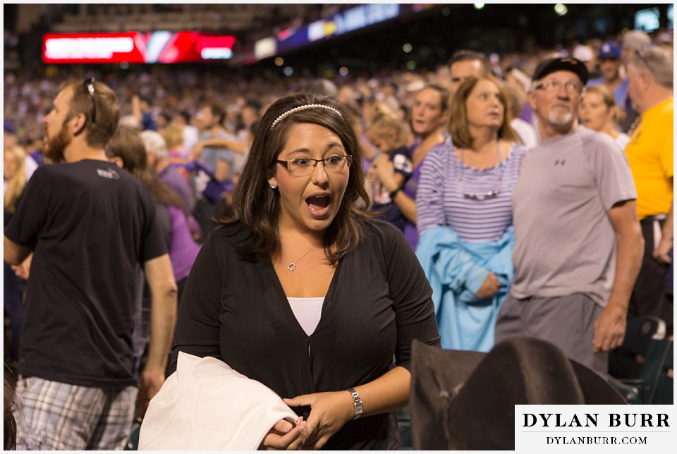 proposal at coors field rockies game kneeling down to her suprise