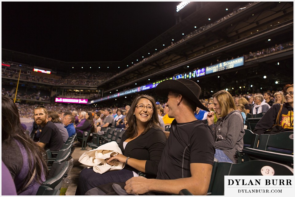 proposal at coors field rockies game couple so happy