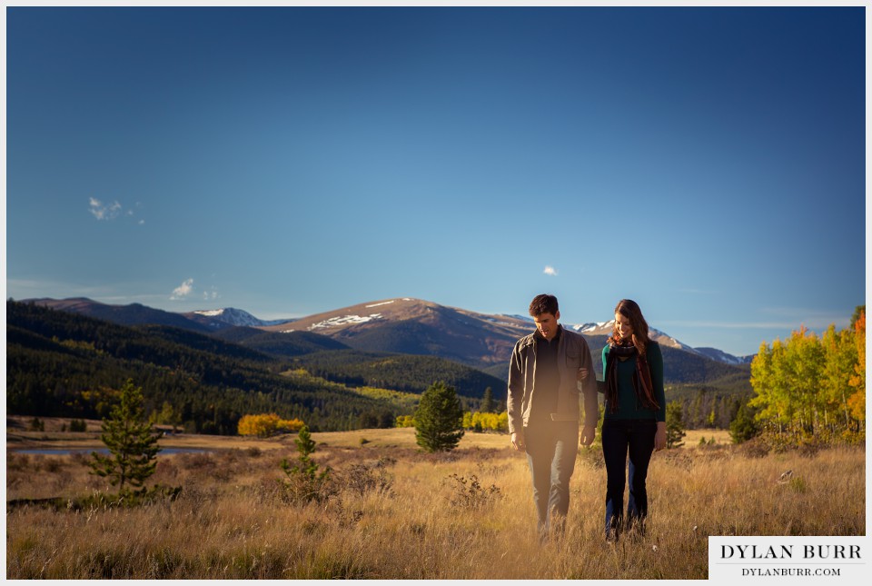 fall colorado engagement photos mountains snow capped