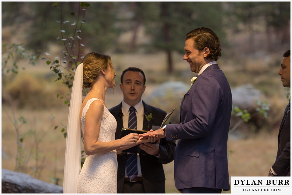 della terra wedding estes park colorado mountain wedding exchanging rings