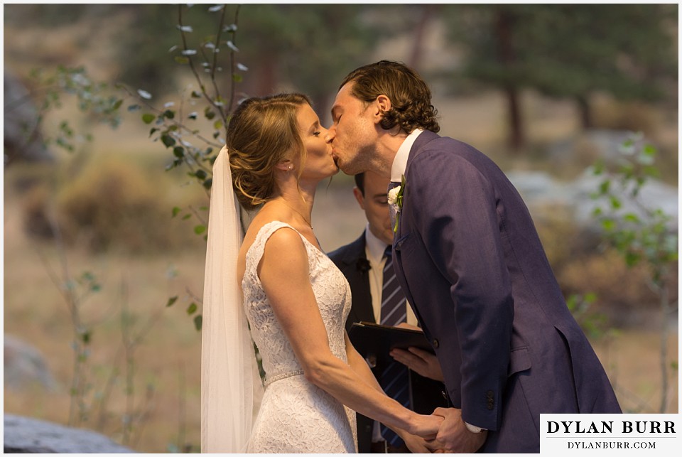 della terra wedding estes park colorado mountain wedding first kiss ceremony