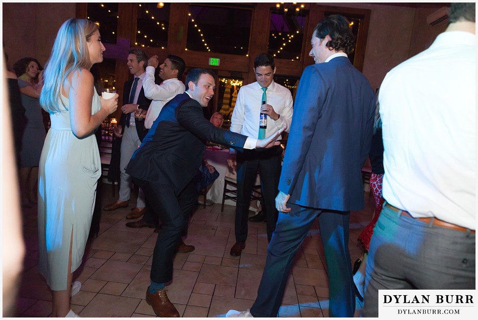 della terra wedding estes park colorado mountain wedding best man dancing with groom