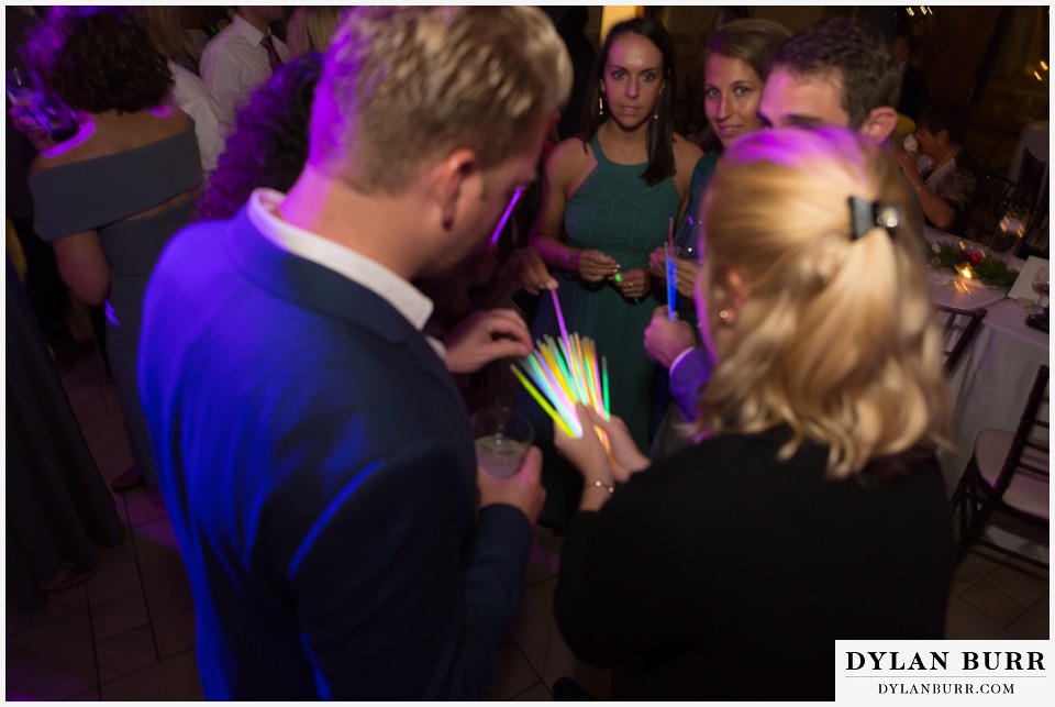 della terra wedding estes park colorado mountain wedding handing out glow sticks