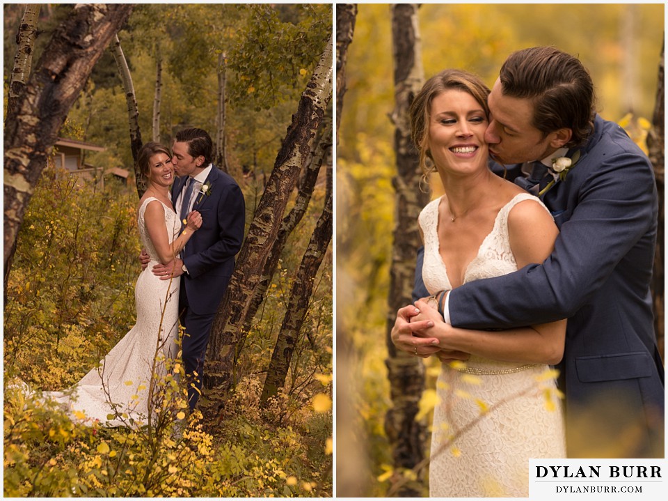 della terra wedding estes park colorado mountain wedding couple kissing in the aspens