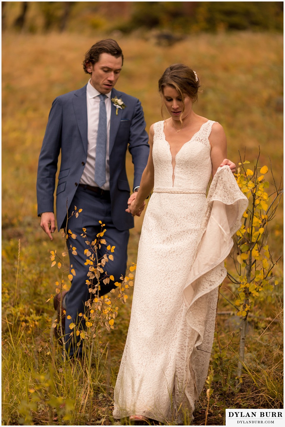 della terra wedding estes park colorado mountain wedding walking in fall colors