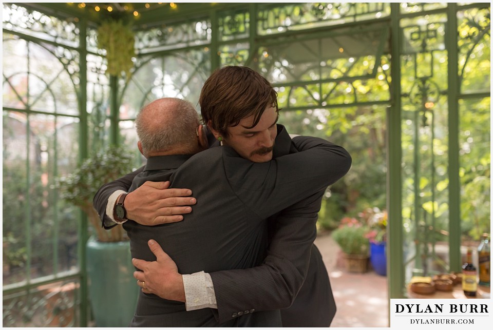 denver botanic gardens wedding colorado woodland mosaic groom hugging brides father