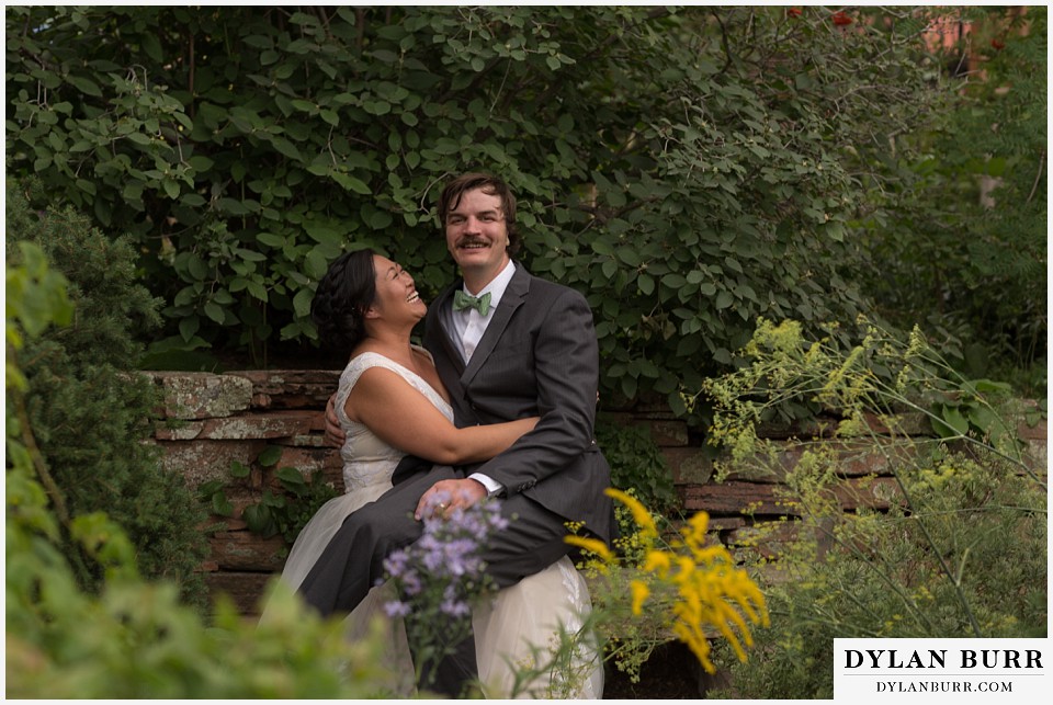 denver botanic gardens wedding colorado woodland mosaic groom sitting on his brides lap