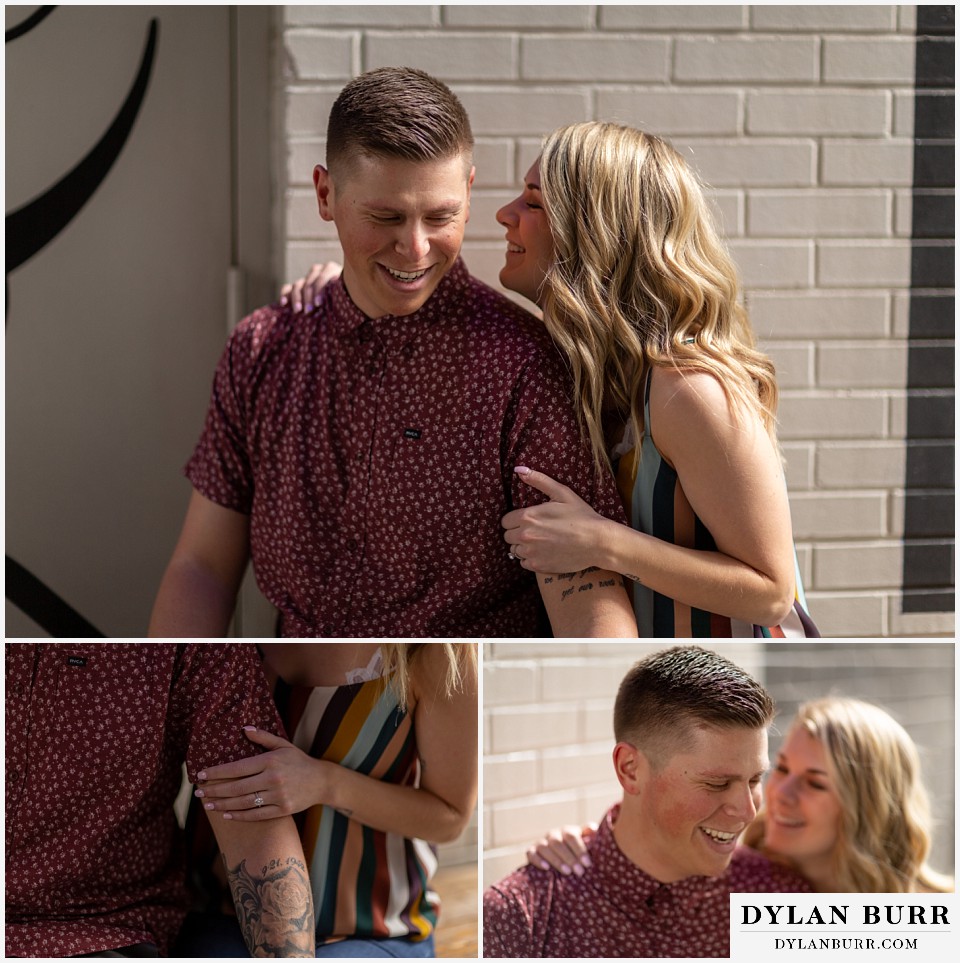 denver engagement photos dairy block downtown denver whispering in his ear