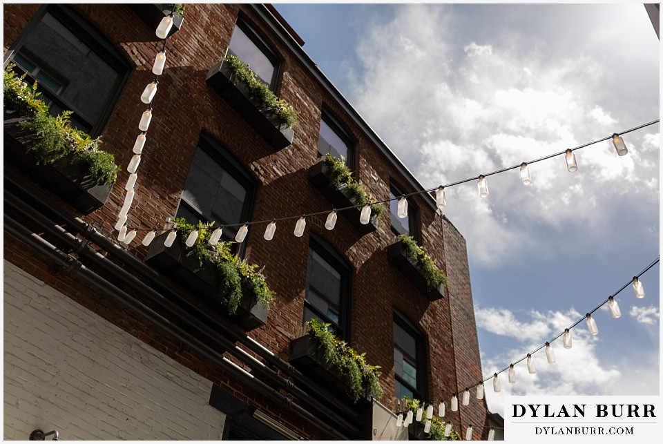 denver engagement photos dairy block downtown denver milk jug lanterns