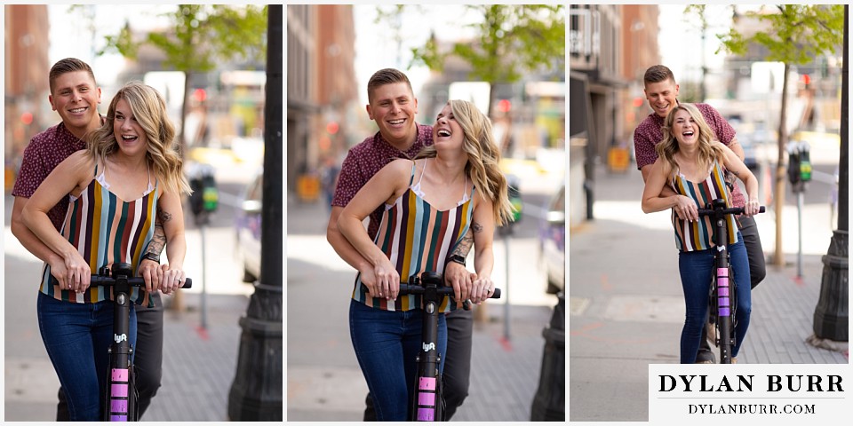 denver engagement photos dairy block downtown denver riding together on a scooter